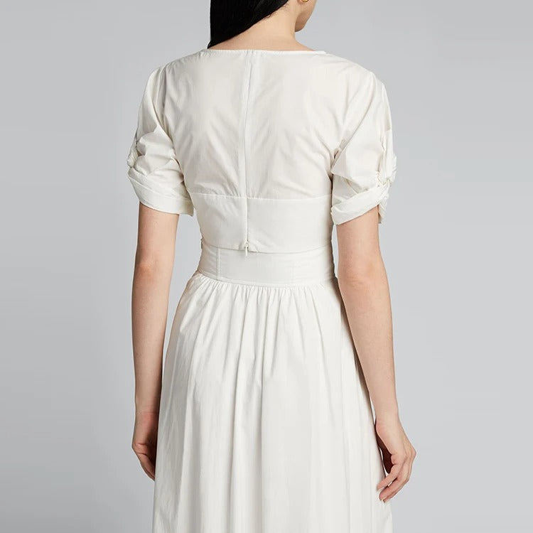 Biały komplet crop top z bufiastymi rękawami i spódnica maxi