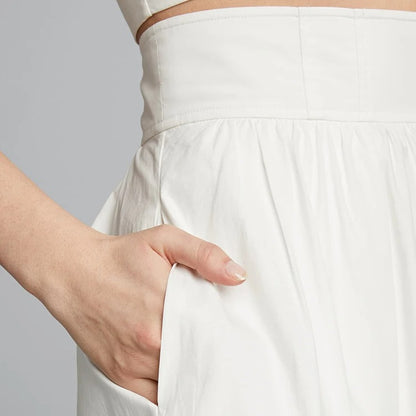 Biały komplet crop top z bufiastymi rękawami i spódnica maxi